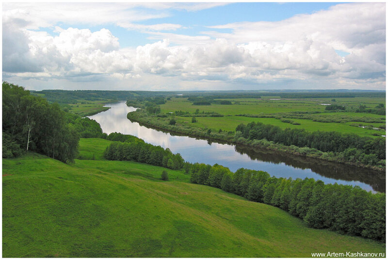 River Winding Through Green Fields — Serene