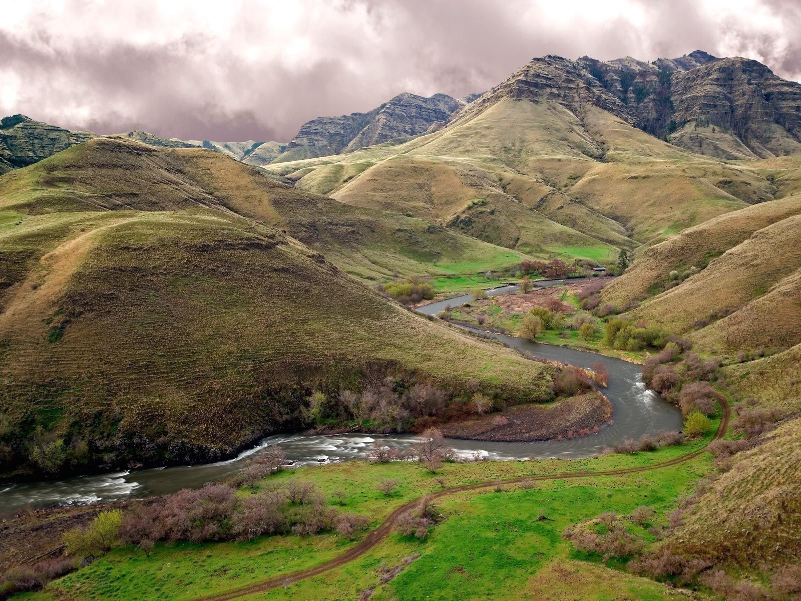 River winding through green hills