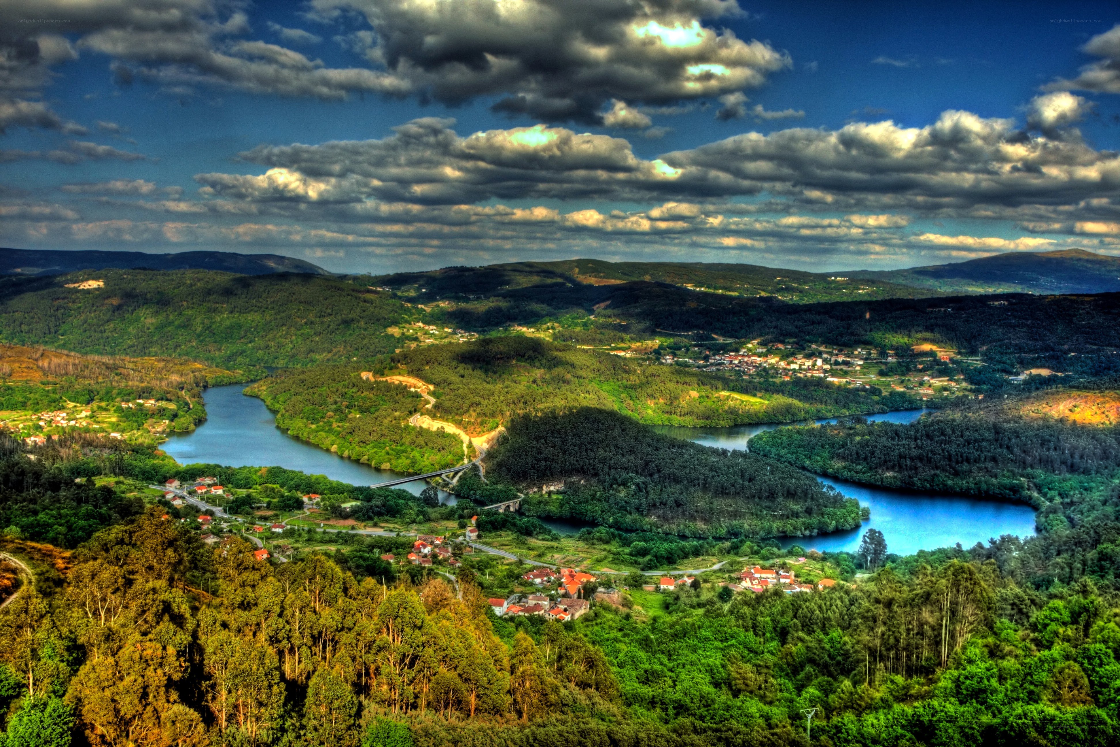 River winding through green hills