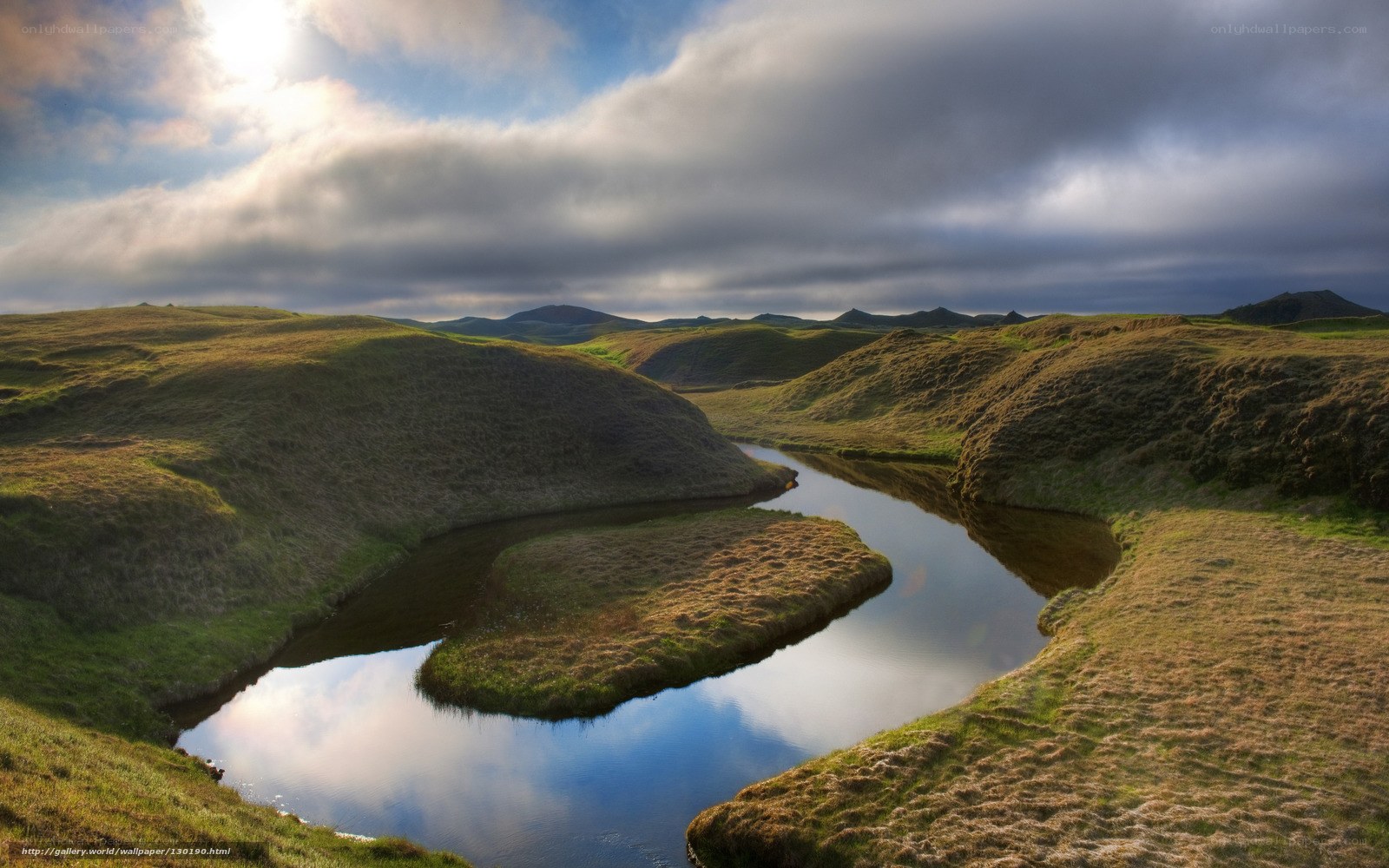 River winding through green hills