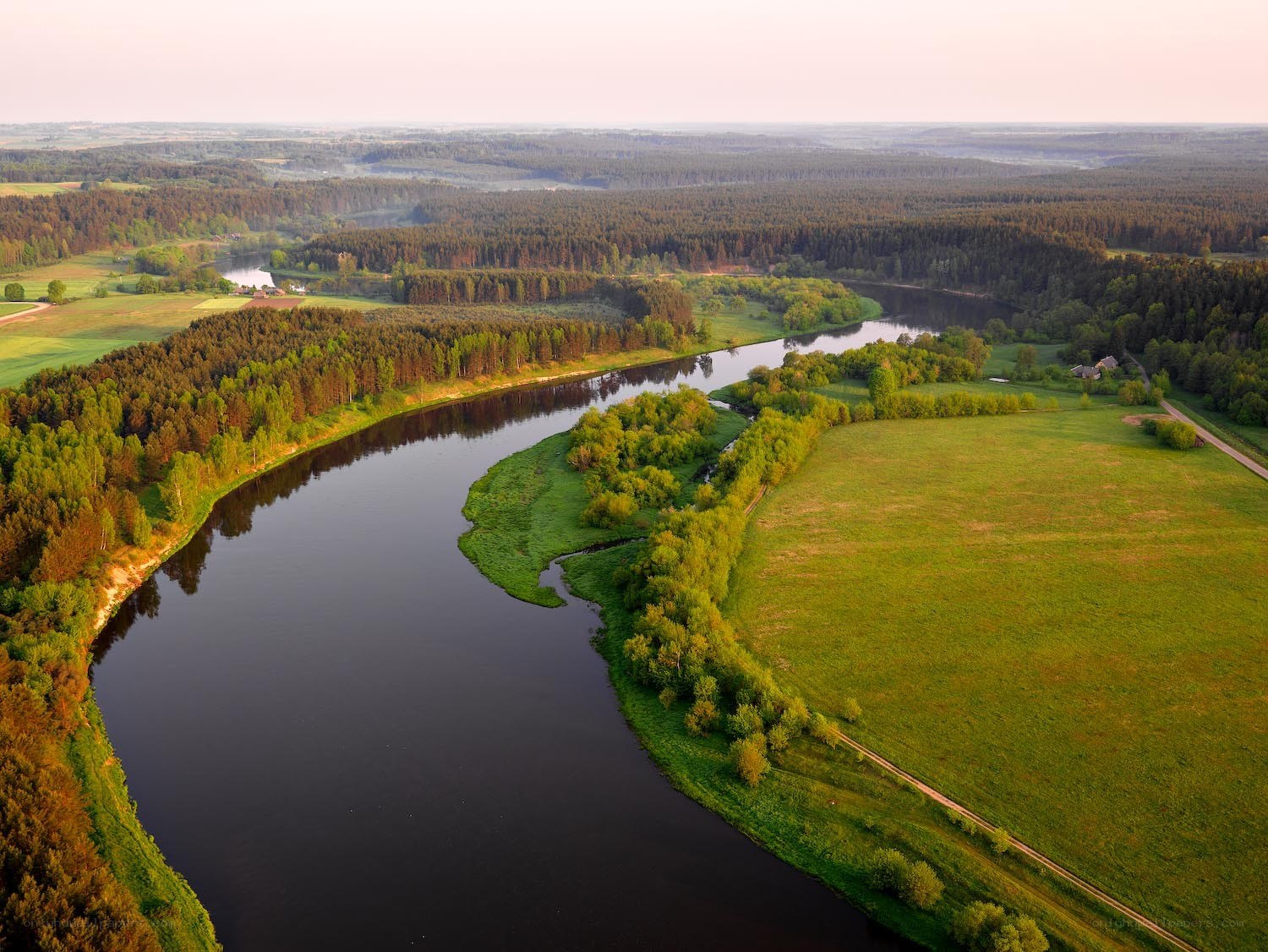 River winding through green landscape