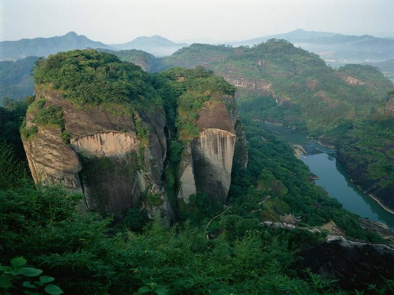 river winding through green mountains