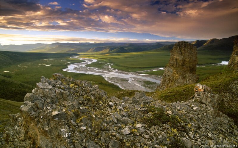 River winding through green valley