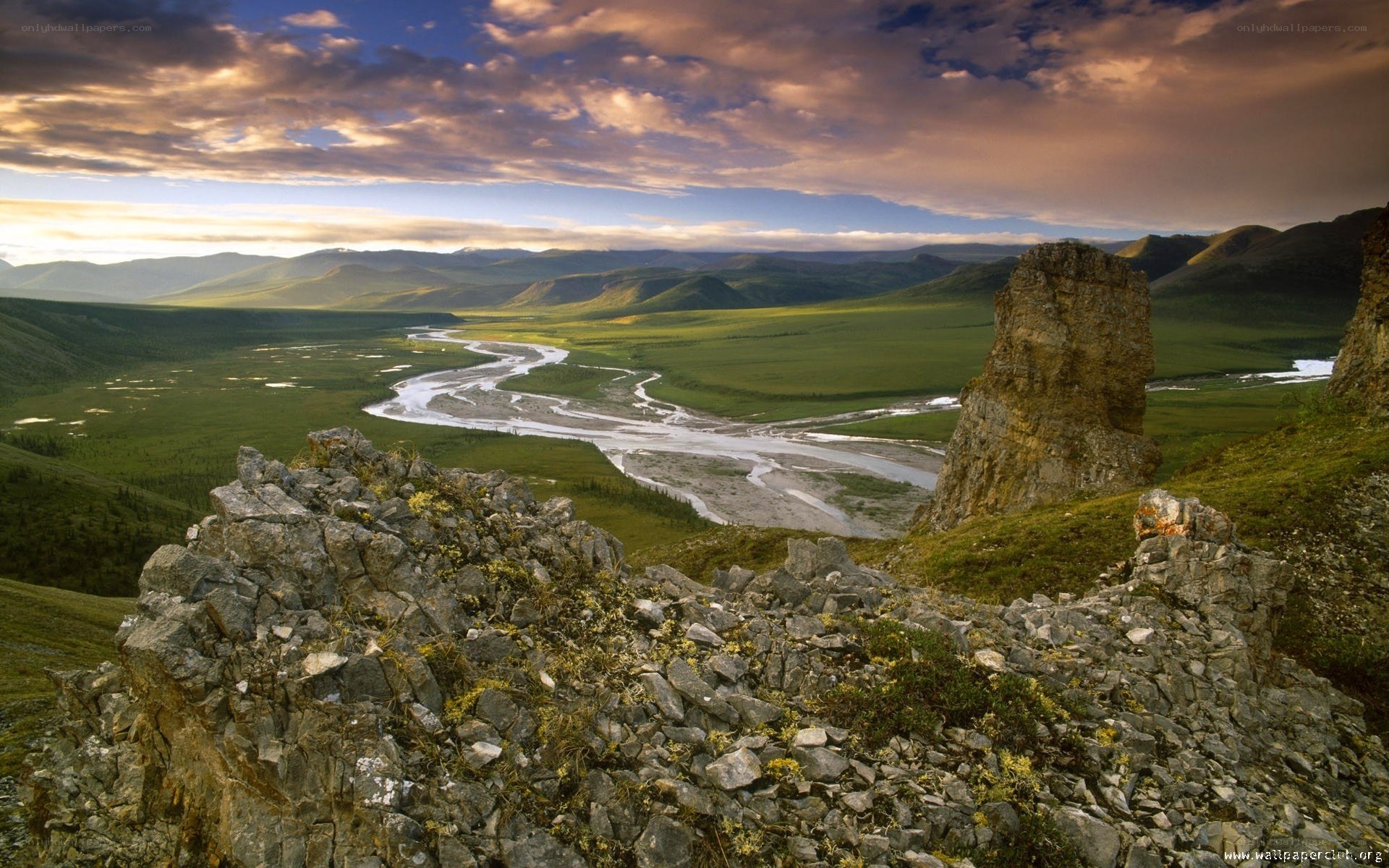River winding through green valley