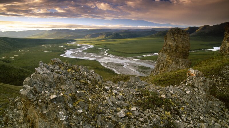River winding through green valley