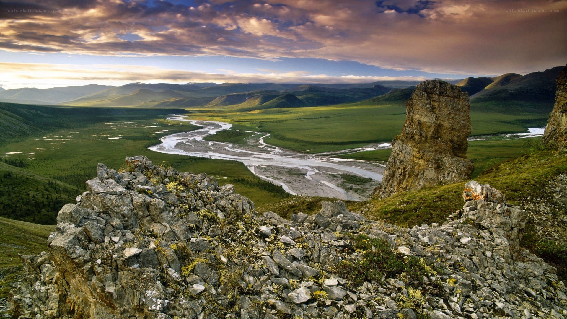 River winding through green valley