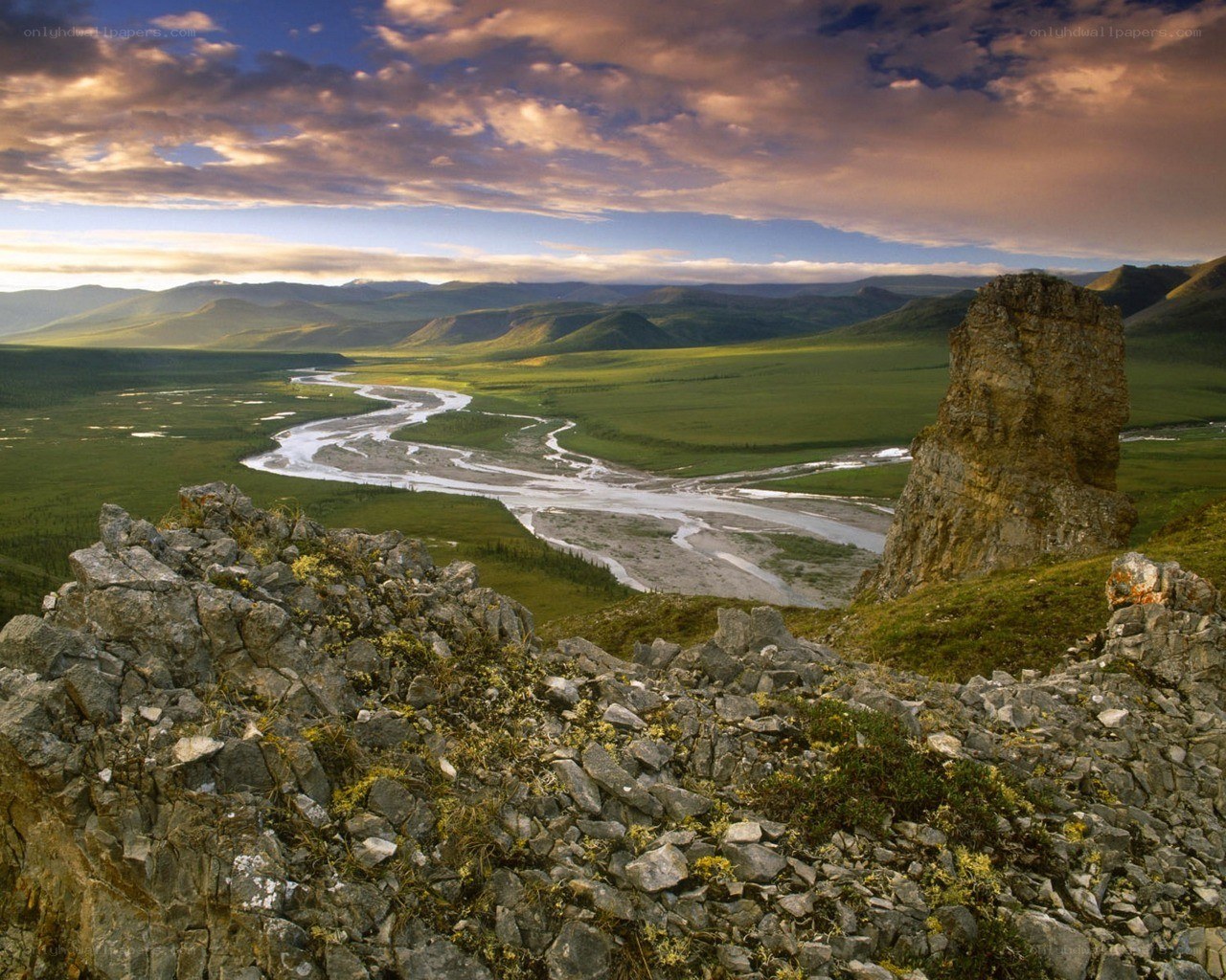River winding through green valley