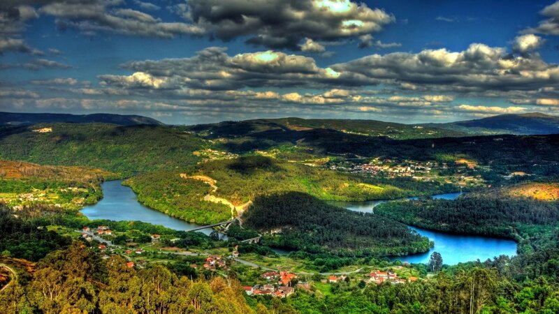 River Winding Through Hills — Green, Dramatic