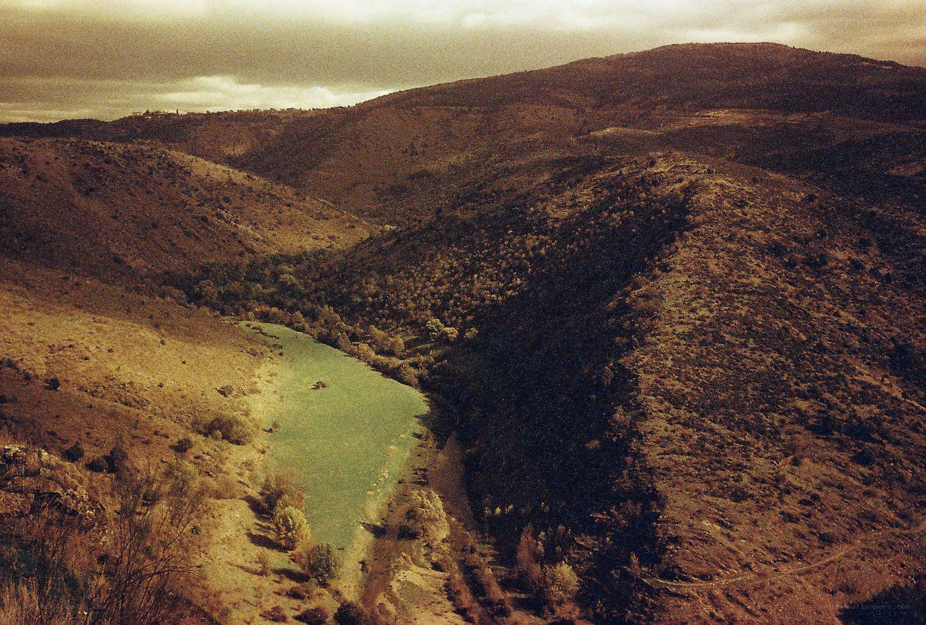 River winding through hilly landscape