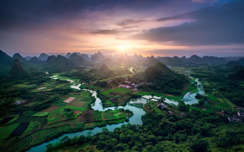 River Winding Through Karst Landscape