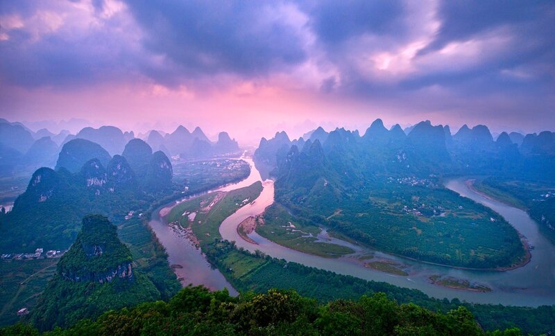 River Winding Through Karst Mountains — Purple
