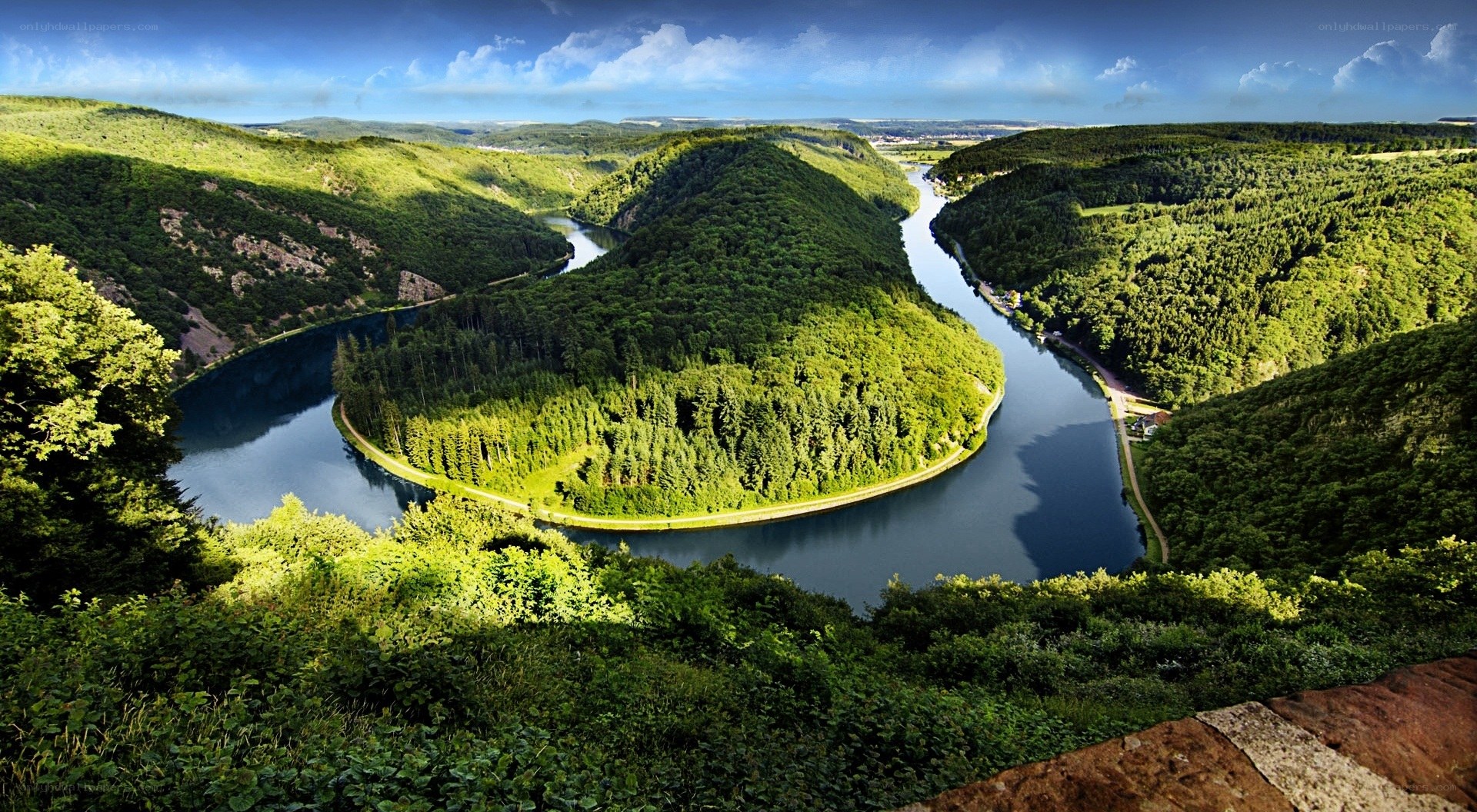 River winding through lush green hills