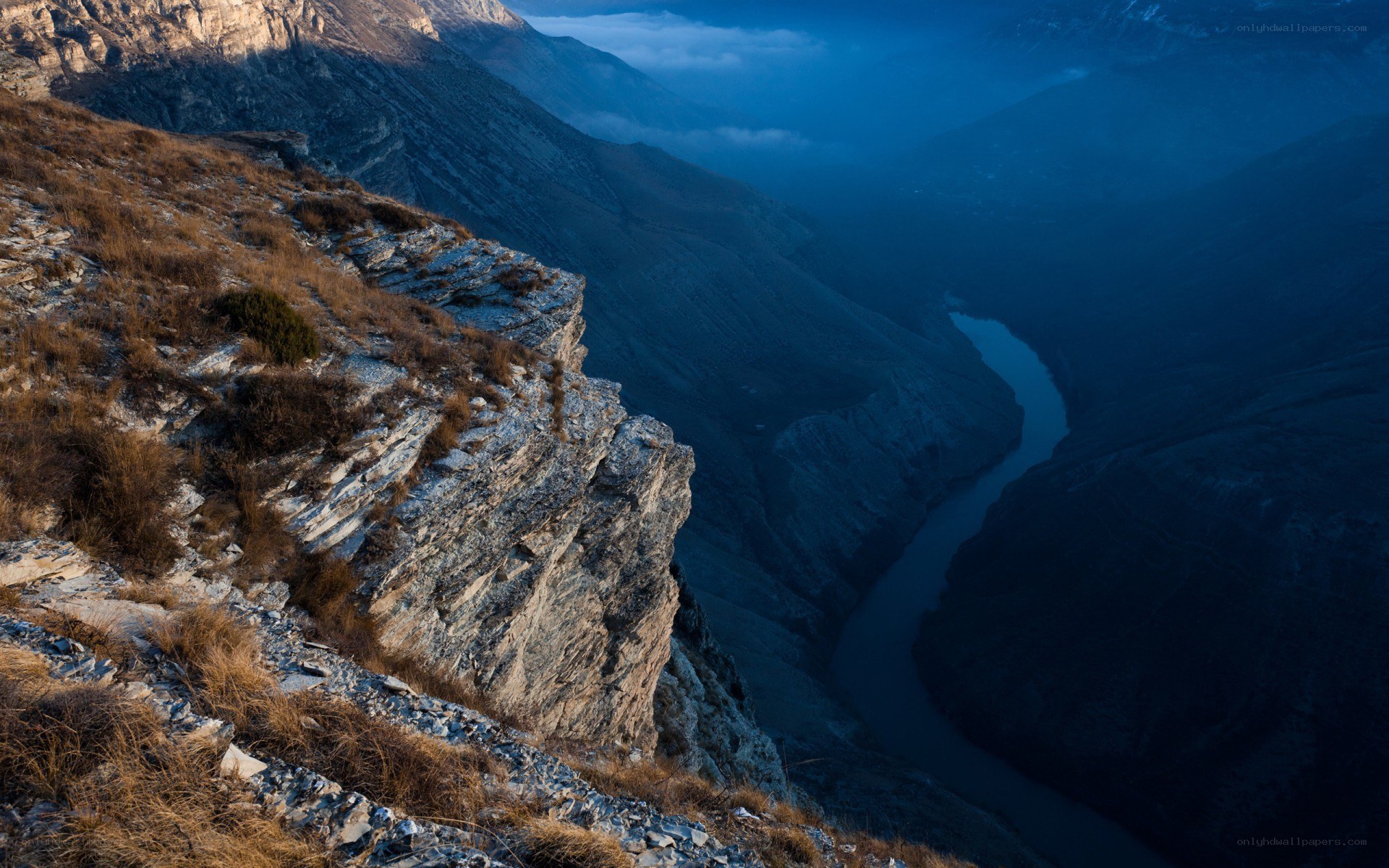 river winding through mountain canyon