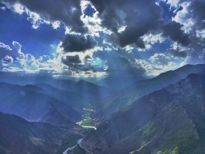 River Winding Through Mountains — Blue, Dramatic