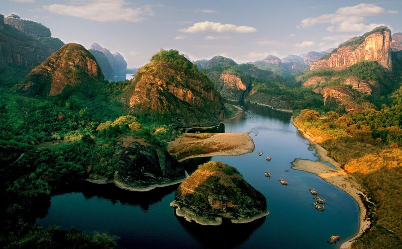 River Winding Through Mountains — Blue, Serene, Afternoon, Photograph, Boats, Trees