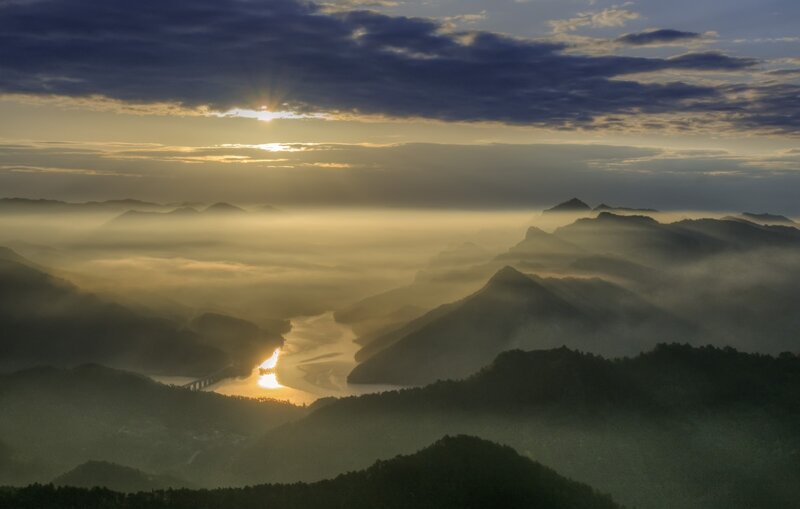 River Winding Through Mountains — Gold