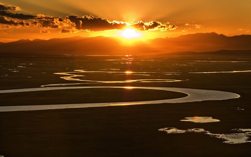 River Winding Through Plain — Orange, Dramatic, Sunset
