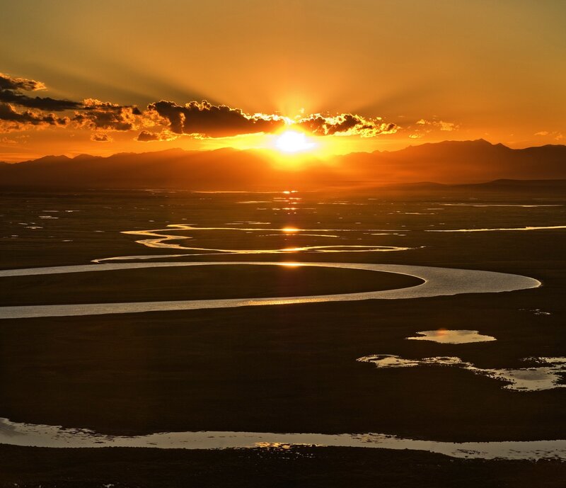 River Winding Through Plain — Orange