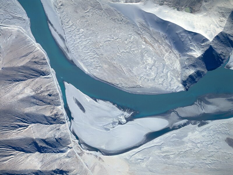 river winding through snowy landscape