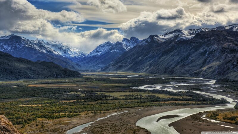 River Winding Through Valley — Blue, Dramatic, Afternoon, Photograph, Mountains