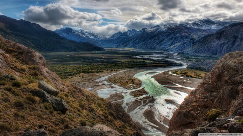 River Winding Through Valley — Blue, Dramatic, Afternoon, Photograph