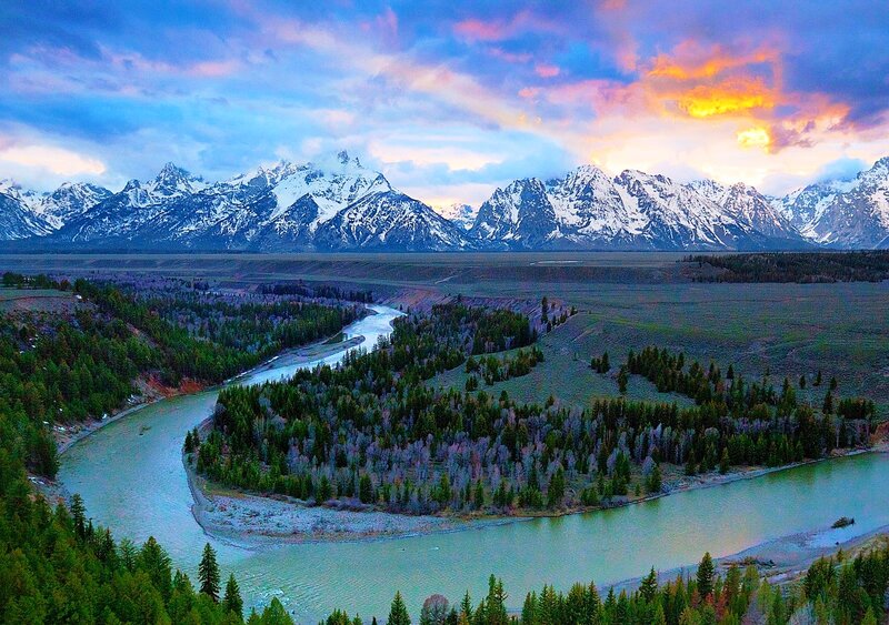 River Winding Through Valley — Blue, Dramatic, Sunset, Photograph