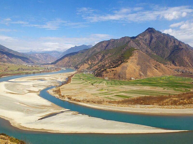 River Winding Through Valley — Blue, Serene, Afternoon