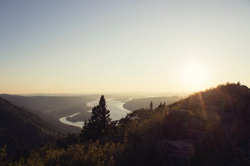 River Winding Through Valley — Blue, Serene, Sunset, Photograph