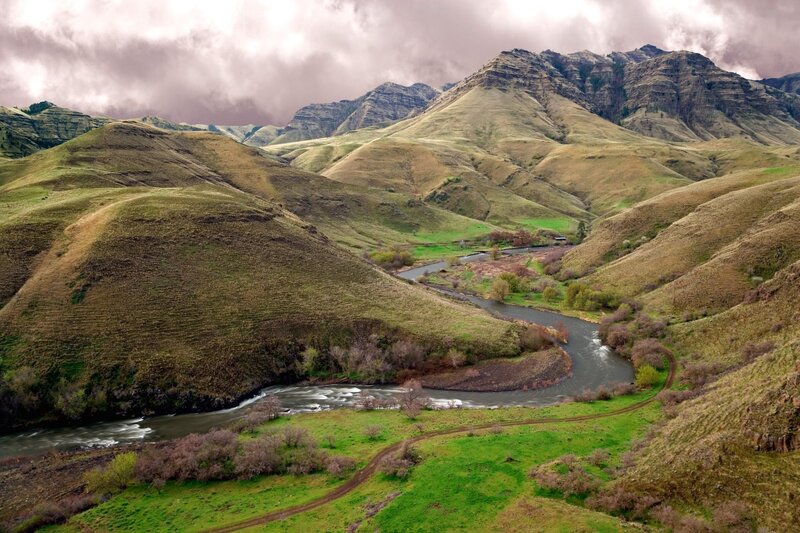 River Winding Through Valley — Green, Dramatic, Spring