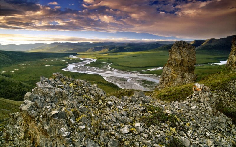 River Winding Through Valley — Green, Dramatic, Sunset, Photograph, Mountains, Rocks
