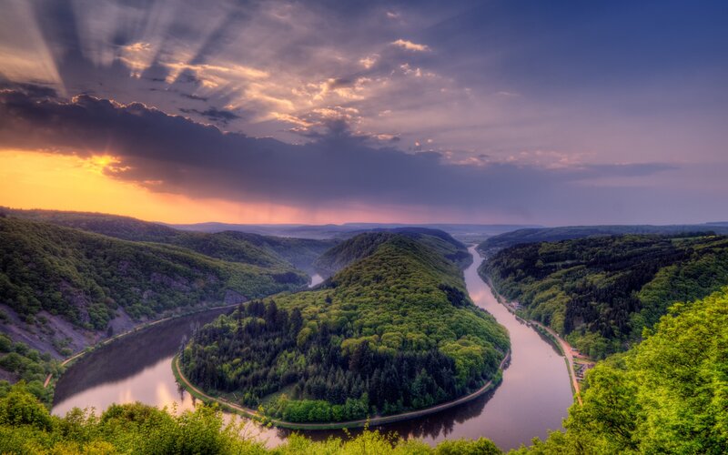 River Winding Through Valley — Green, Dramatic