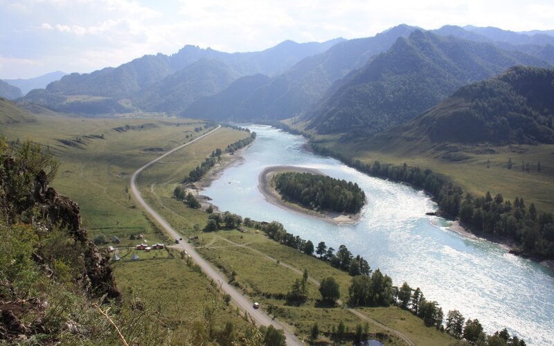 River Winding Through Valley — Green, Serene, Afternoon, Photograph, Mountains, Road, Trees