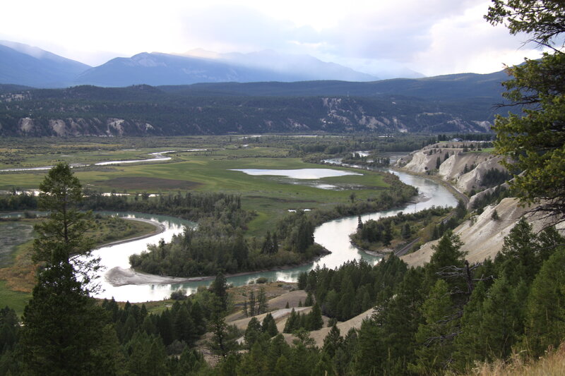 River Winding Through Valley — Green, Serene, Afternoon