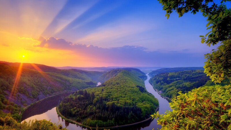 River Winding Through Valley — Green, Serene, Sunset, Photograph, Sun, Trees