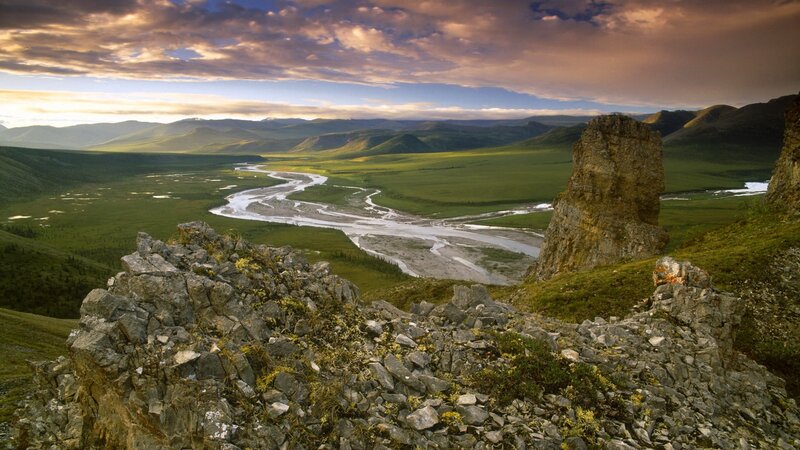 River Winding Through Valley — Green, Serene, Sunset