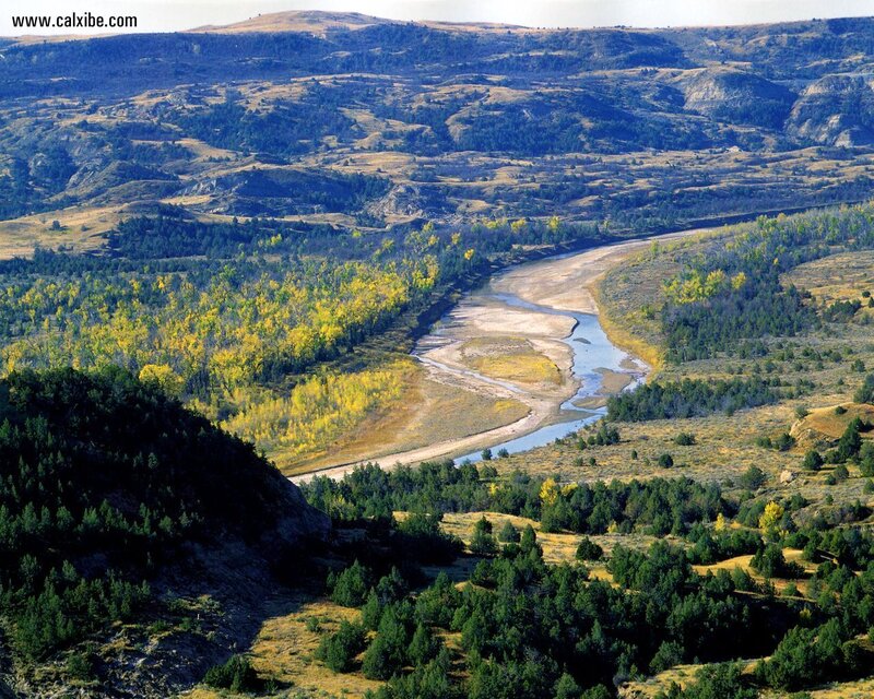 River Winding Through Valley — Green, Serene