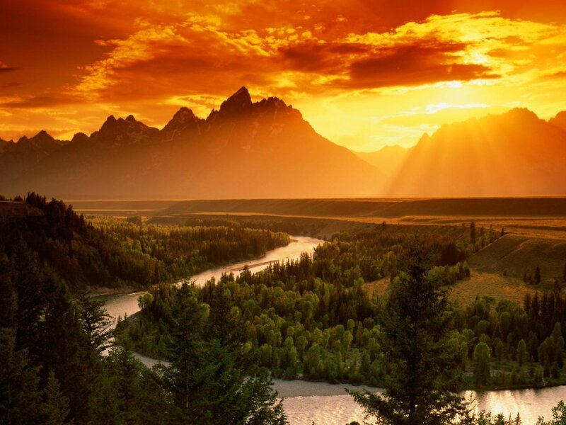 River Winding Through Valley — Orange, Dramatic