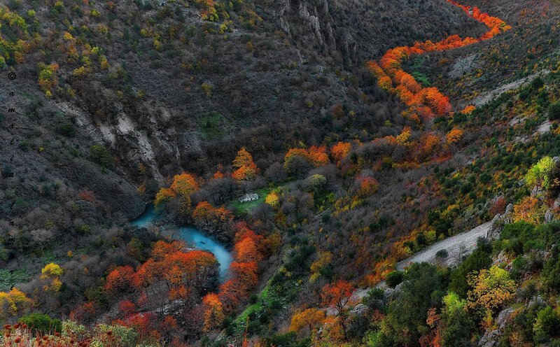 River Winding Through Valley — Orange, Serene, Autumn