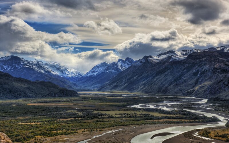 River Winding Through Valley — Photograph
