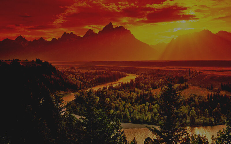River Winding Through Valley — Red, Dramatic