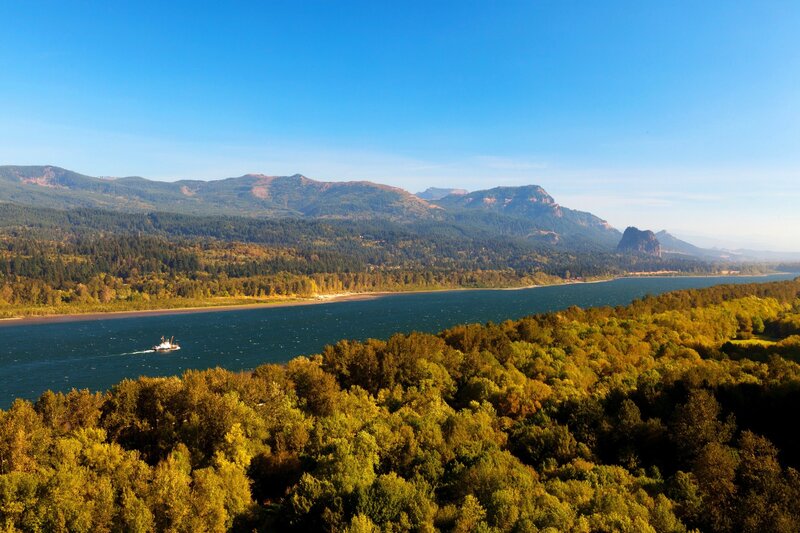 River with Boat and Mountains