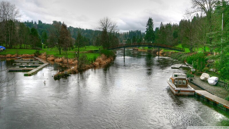 River with Boats and Bridge