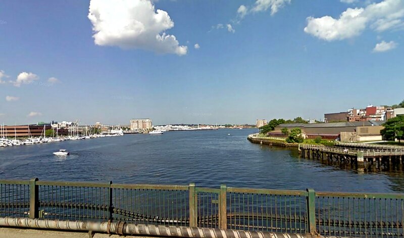 River with Boats and Buildings