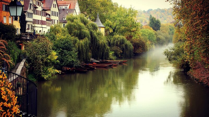 River with Boats and Houses