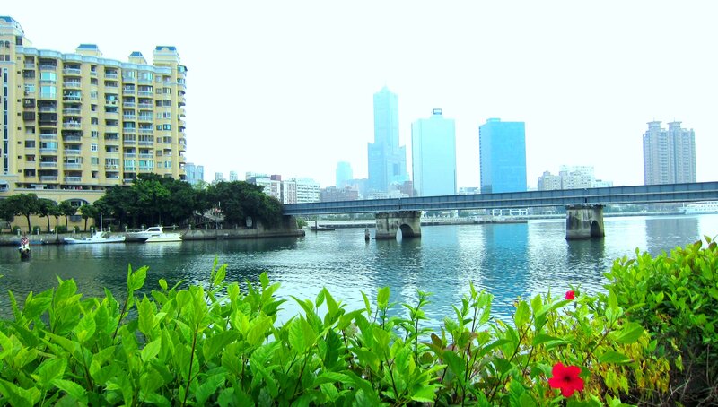River with Bridge and Buildings — Green