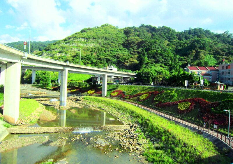 River with Flower Beds