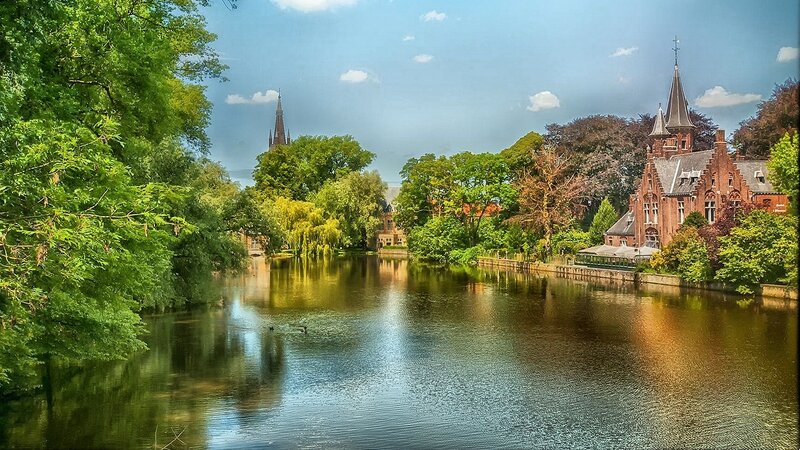 River with Historic Buildings — Green, Serene