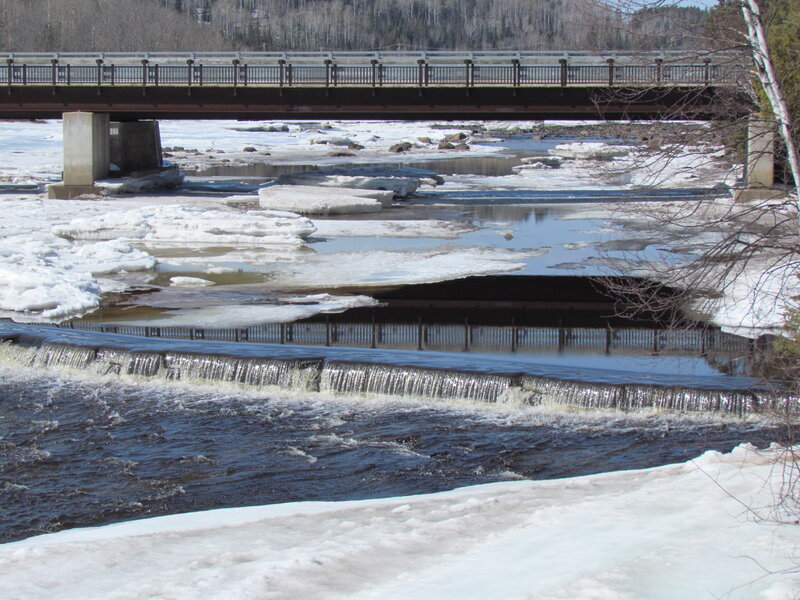 River with Ice and Bridge