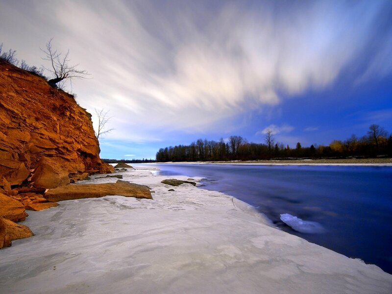 River with Ice and Cliffs