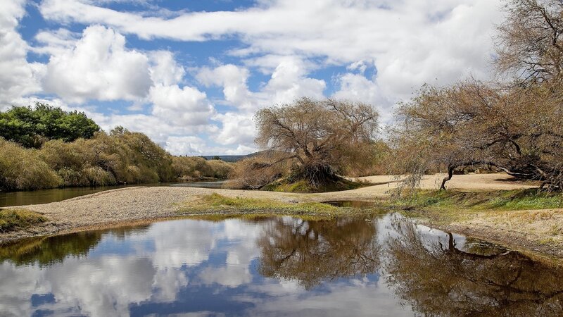 River with Reflective Water — Blue